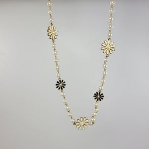 New. Floral and pearls necklace. 16' long